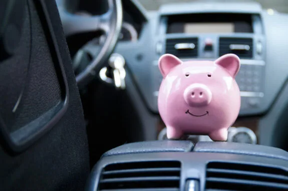 Piggy bank in a car